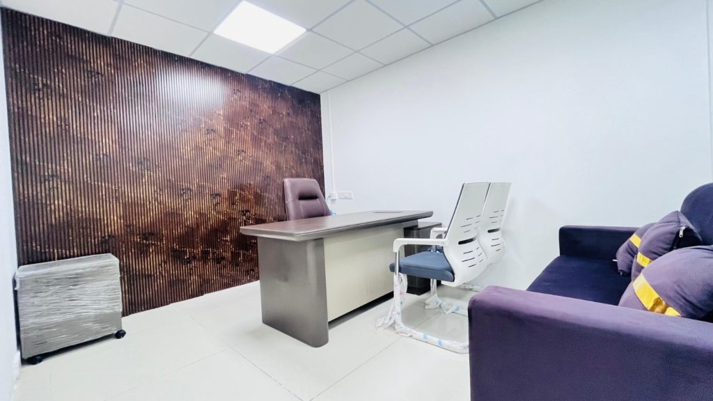 Executive office cabin with premium desk, visitor chairs and sofa at Covibe Coworking Space Hyderabad