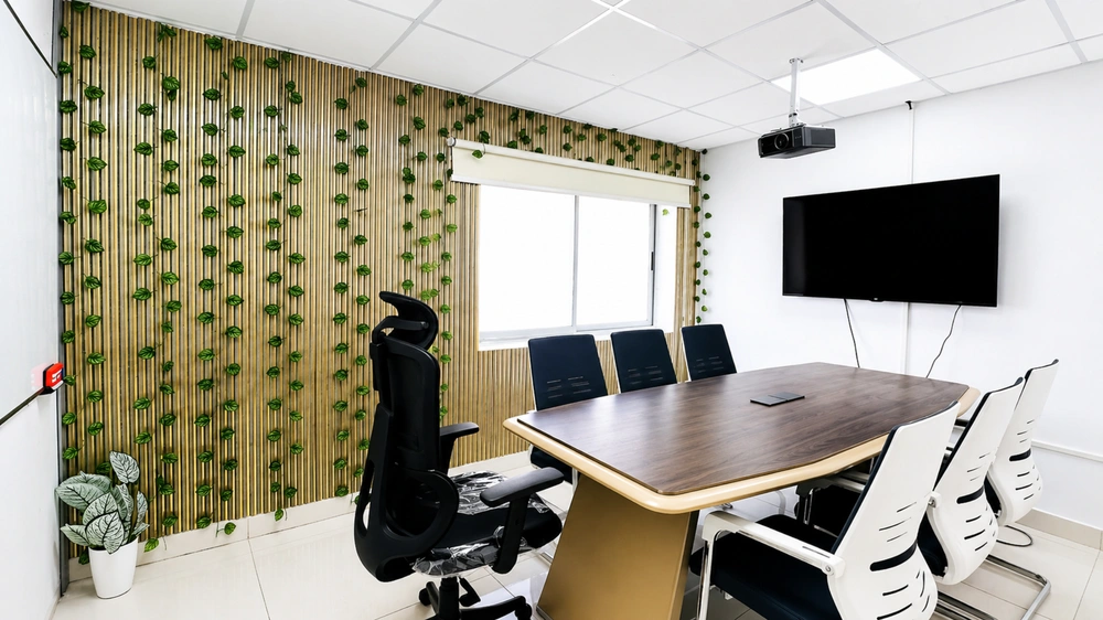 Conference hall at Covibe Ameerpet with projector and professional meeting seating